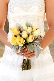 Brides dress and lovely yellow flowers